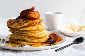 Ricotta and rosemary hotcakes with maple peaches recipe
